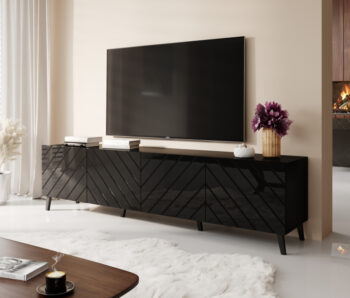 TV stolík ABETO 200 má elegantný a jedinečný dizajn, ktorý Vás očarí svojou výnimočnosťou. Farebné prevedenie čierna / čierny lesk dodáva interiéru exkluzívny vzhľad, ktorý zaručene zaujme pohľady Vašich návštevníkov. Uzavreté skrinky Vám ponúkajú dostatok úložného priestoru pre dokumenty a doplnky…