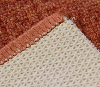 Associated Weavers, Protišmykový behúň na mieru Bombay 84, šíre 67 cm, oranžová, chodba / predsieň