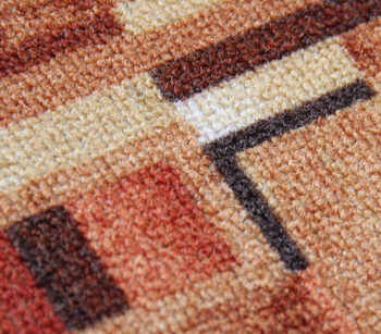 Associated Weavers, Protišmykový behúň na mieru Bombay 84, šíre 67 cm, oranžová, chodba / predsieň