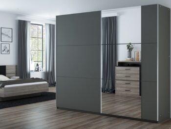 Šatníková skriňa BASIA je vyrobená v modernom dizajnovom prevedení. Spojenie so zrkadlovou plochou zaručuje eleganciu a šmrnc. Farebné prevedenie bolo volené podľa aktuálneho trendu. Neutrálne farebné prevedenie skrine Vám dáva možnosť dotvoriť si interiér ďalšími farbami a prvkami.  Skriňa ponúka dostatočný priestor na uloženie Vášho oblečenia, či iných predmetov.   Skriňa je vyrobená z kvalitnej LTD dosky, ktorá nie je náročná na údržbu. Farebné prevedenie: grafit. Rozmer (v/š/h) 215 x 250 x 65 cm. Dodávame v demonte.