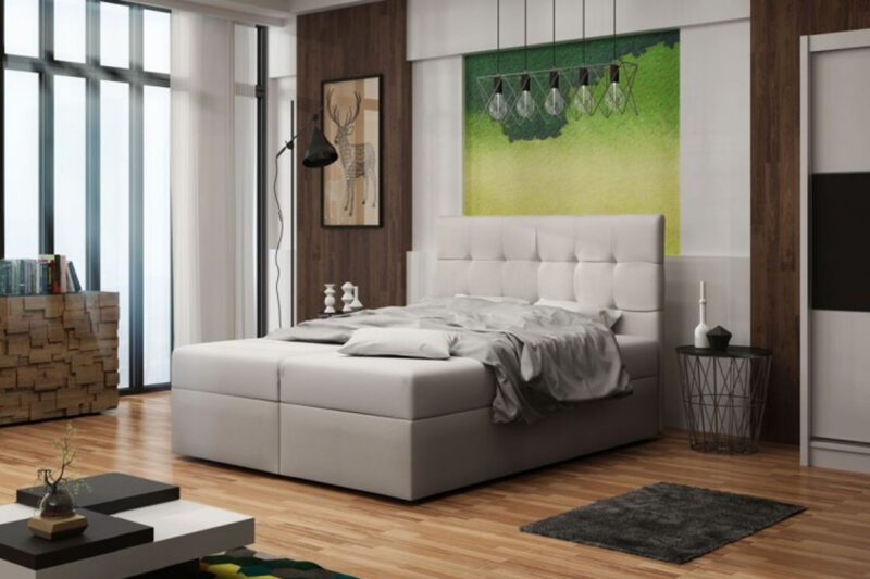 BONEMI 2 čalúnená manželská posteľ 160 x 200 cm, béžová COSMIC 10 Štýlová a elegantná posteľ BONEMI je v modernom prevedení. Patrí medzi postele typu BOXSPRING. Výrazným dizajnovým prvkom je jej čelo, ktoré tiež ochráni vašu stenu pred oderom.Posteľ je čalúnená. Použitá je látka COSMIC 10. Súčasťou postele je kvalitný bonellový matrac. Pre väčší komfort si môžete dokúpiť praktický vrchný krycí matrac TOPPER (viď. doporučené produkty).Disponuje veľkým úložným priestorom, ktorý je vhodný na uloženie perín, obliečok a podobne.Rozmery (š,v,h): 163 x 101 x 217 cm. Výška čela postele: 101 cm. Výška spacej plochy: 42 cm. Matrac o výške 18 cm. Spacia plocha: 160 x 200 cm.V našej ponuke nájdete aj ďalšie prevedenia a rozmery manželských postelí BONEMI.Dodávame v demontovanom stave.