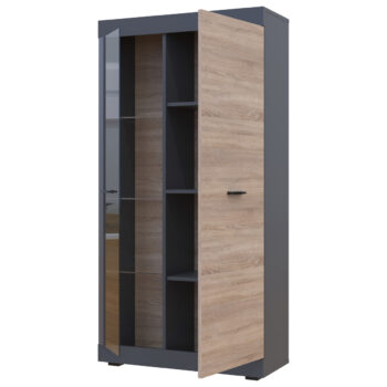 Dvojdverová vitrína Dolin CT v prevedení grafit / dub sonoma je moderným a praktickým kusom nábytku, ktorý sa hodí do každého interiéru. Jej tmavá farba dodáva priestoru eleganciu a štýl. Vitrína je vyrobená z aglomerovaného materiálu DTD, ktorý je známy svojou odolnosťou a dlhou životnosťou.