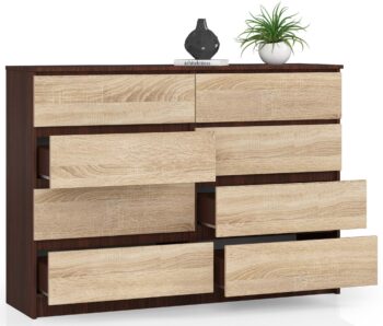 Komoda SAMUEL140: Elegancia wenge spojená s teplom duba Sonoma Chcete obohatiť svoj interiér o prvok, ktorý kombinuje tmavú mystiku wenge s prírodným charakterom duba Sonoma? Komoda SAMUEL140 presne spĺňa tieto požiadavky, a navyše ponúka kombináciu funkčnosti s dizajnovým prevedením.  Typ tovaru: Komoda, skrinka Materiál: Odolný a dlhoročný LTD Rozmer: 99 x 138 x 40 cm - priestranná, ale zároveň elegantne štíhla < li>Farba: Tmavé tóny wenge harmonicky doplnené svetlejším dubom Sonoma Vybavenie: 6 priestranných zásuviek a ďalšie úložné priestory < strong>Štýl: Moderné a dizajnové riešenie Vzhľad: Vysoký dizajn, ktorý opticky zväčší priestor  SAMUEL140  sa dokonale hodí do každej spálne či obývacej izby, kde sa stane nielen užitočným úložným miestom, ale aj štýlovým doplnkom interiéru. Dajte svojim veciam domov v dizajne, ktorý nikdy nevyjde z módy.