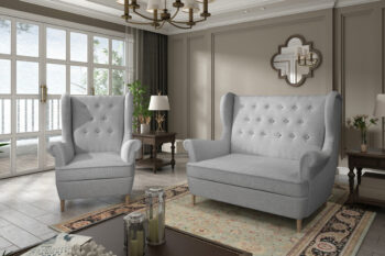 Dizajnové kreslo ANKALIA je v tradičnom prevedení. Je vhodné do moderných aj tradičných interiérov. Kreslo ANKALIA je v štýle ušiak. Stane sa vašim výborným spoločníkom pri leňošení.Kreslo je vyplnené kvalitnými vlnovcovými pružinami spolu s PUR penou. Je celé čalúnené látkou Sawana 21 v svetlošedej farbe.Rozmery kresla (š,v,h): 85 x 103 x 90 cm.Je vynikajúcim doplnkom k pohovkám ANKALIA, ktoré sú v rovnakom dizajne.