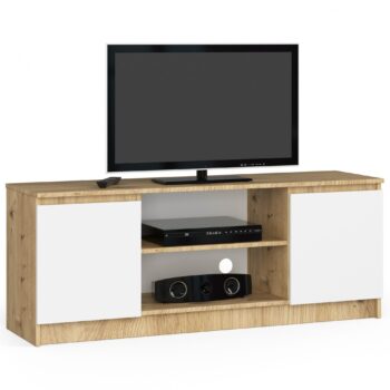 TV stolík ROMANA140: Elegancia dreva dub artisan kombinovaná s čistou bielou TV stolík ROMANA140 kombinuje eleganciu odtieňa duba artisan s čistou bielou farbou, čo ho robí dokonalým doplnkom pre moderné obývacie izby. Jeho dizajnový a zároveň praktický dizajn spĺňa očakávania aj tých najnáročnejších užívateľov.  Typ tovaru: TV stolík Materiál: LTD Rozmery: 55 x 140 x 40 cm Farba: dub artisan + biela Vybavenie: dvierka plné (skrinka) Štýl: moderné, dizajnové Počet políc: 2  Stolček ROMANA140 nielenže esteticky obohatí vaše obytné priestory, ale vďaka plným dvierkam a dvom praktickým policam ponúkne dostatok úložného priestoru pre televízne prístroje, ovládače a ďalšie doplnky.