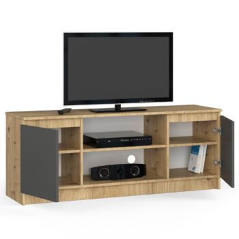 TV stolík ROMANA140: Spojenie dreva dub Artisan a moderného grafitom TV stolík ROMANA140 predstavuje dokonalú harmóniu medzi tradičným vzhľadom dreva dub Artisan a moderným grafitom. Tento dizajnový kúsok sa skvele hodí do každej obývačky, ktorá si zakladá na modernom štýle s nádychom klasiky.  Typ tovaru: TV stolík  Materiál: LTD Rozmery: 55 x 140 x 40 cm Farba: dub Artisan + grafit Vybavenie: dvierka plné (skrinka) Štýl: moderné, dizajnové < strong>Počet políc: 2  Stolček ROMANA140 ponúka nielen štýlový vzhľad, ale aj praktické dvierka a dve police pre úložný priestor. Ideálne pre tých, ktorí hľadajú kombináciu funkčnosti a estetiky v jednom produkte.