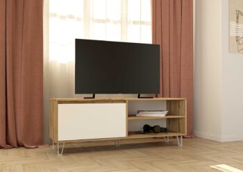 Zaujímavý trendový televízny stolík ELIZA v modernom dizajne a v žiadanej farebnej kombinácií šedý grafit + biela. Vďaka svojim rozmerom je vhodný aj do menších miestností.TV stolík má zapustený úchyt na otváranie, čo podčiarkuje jeho moderný vzhľad. Poskytuje dostatok úložného priestoru v podobe uzatvorenej skrinky aj otvorených políc.Korpus a dvierka stolíka sú zkvalitnej laminovanej dosky, odolnej voči poškrabaniu, ktorá je veľmi jednoduchá na údržbu. Štýlové biele nožičky sú vyrobené z kovu.Rozmery: (š/v/h) 140 x 52 x 40,3 cm.Dodávame v demonte.