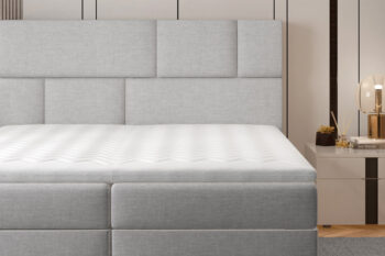 Posteľ FANCY patrí medzi boxspringové postele. Najvýraznejším prvkom je vyvýšené čelo postele, ktoré poskytne pohodlnú opierku hravy a ochráni stenu pred oderom. Jednoduché prešívanie vytvára jemný obdĺžnikový vzor, ktorý sa stane ozdobou Vašej spálne. Jednofarebné prevedenie dáva možnosť variabilnej kombinácie s ďalším nábytkom či farbami. Výška ložnej plochy poskytne pohodlné vstávanie a sadanie na posteľ. Moderný dizajn postele je prepojený s praktickým riešením priestoru. Posteľ ponúka spaciu plochu 185 x 200 cm, členenú na dve časti. Pod každou z nich nájdete úložné boxy. Využívajú UP systém otvárania, vďaka ktorému sa jednoduchým spôsobom dostanete ku predmetom uloženým v boxoch.Jednostranný matrac je z bonellovej pružiny, kombinovaný s PUR penou T25. Pre ešte lepší pocit je súčasťou postele horný topper s výškou 4 cm. Poťah je hypoalergénny, snímateľný a prateľný pri 40 ℃. Posteľ je celočalúnená kvalitnou látkou Omega 68.Rozmery (š/v/h): 185 x 124 x 210 cm. Výška ložnej plochy je 54 cm. Hrúbka zadného čela je 10 cm. Výška nožičiek je 3 cm. Posteľ sa predáva kompletná, nie je potrebné doobjednávať rošt ani matrac. Tvrdosť matraca: H3.V našej ponuke nájdete aj ďalšie rozmery a farebné prevedenia tejto unikátnej postele.   