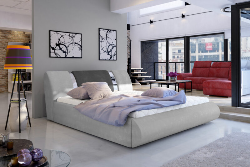 FERIE 160 čalúnená posteľ, Paros 05/06 Čalúnená posteľ FERIE je dominantným prvkom vhodným do modernej spálne. Unikátne čelo postele s výnimočným prevedením zaujme na prvý pohľad. Kombinácia látky a lesklých pruhov zvýrazňuje celkový vzhľad. Oblúkové tvary dodávajú posteli ladnosť a eleganciu.Vďaka výklopnému systému roštu ponúka posteľ úložný priestor, ktorý oceníte v každej domácnosti. Mäkké časti postele sú vyrobené z PUR peny T 2542 a čalúnené látkou Paros 05/Paros 06. Súčasťou postele je rošt, matrac je potrebné si doobjednať. Odporúčame rozmer 160 x 200 cm, resp. 2 ks s rozmerom 80 x 200 cm.Posteľ FERIE 160 patrí medzi manželské postele. Ponúka spaciu plochu 160 x 200 cm. Výška sedenia bez matracu je 32 cm. Celkový rozmer postele (š/v/h): 177 x 239 x 83 cm.V našej ponuke nájdete túto posteľ vo viacerých farebných prevedeniach aj šírkach. Dodávame v demonte.