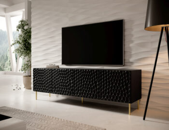 TV stolík HOLE 190 Vás očarí novodobým dizajnom, ktorý bude skvelým doplnkom vo Vašej domácnosti. Má elegantný a nadčasový dizajn, ktorý nezostane nepovšimnutý. Čierne farebné prevedenie so zaujímavým tvarom povrchu dvierok dodávajú TV stolíku unikátnosť. Vďaka svojím rozmerom (ŠxHxV): 190x40…