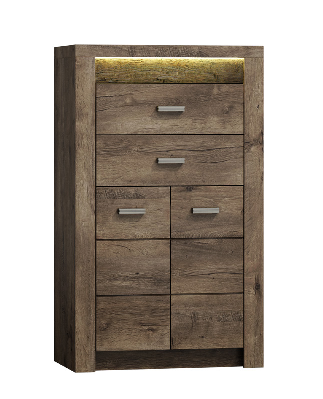 INDIE komoda I-6, jaseň tmavý Kombinovaná komoda I-06 je jedným z 25 prvkov sektorového nábytku INDIE. Tento nábytok je navrhnutý v štýlovom dizajne s jasnou štruktúrou dreva. Spolu s výnimočnou hrúbkou dosky, patinovou úpravou a kovovými úchytmi dáva nábytku rustikálny nádych. Komoda I-06 má v hornej časti šuplíky, spodná časť má plné dvierka. Súčasťou komody je 1 vnútorná polica. Ku komode si môžete za príplatok doobjednať efektné LED osvetlenie dosky (viď odporúčame). Nábytok je vyrobený v kombinácii masívneho dreva a kvalitnej LTD dosky. Doska je opatrená ochrannou ABS hranou. Farebné prevedenie: jaseň tmavý. Úchyty majú odtieň aluminium. Rozmery (v/š/h): 127 x 76 x 42 cm. Hrúbka dosky je 16 /48 mm. Dodávame v demontovanom stave.Sektorový nábytok INDIE je v ponuke v 4 farebných odtieňoch: jaseň tmavý, dub grandson, jaseň svetlý alebo craft biely. Ponúka viacero elementov, z ktorých si môžete zariadiť útulnú obývačku, jedáleň, spálňu ale aj pracovňu. Variabilita a funkčnosť nábytku zaručí praktické využitie priestoru. Jedinečný vzhľad nábytku vnesie do každej miestnosti nezameniteľnú atmosféru a dodá mu šmrnc.