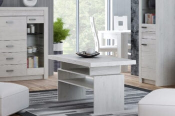 Konferenčný stolík I-13 je jedným z 25 prvkov sektorového nábytku INDIE. Tento nábytok je navrhnutý v štýlovom dizajne s jasnou štruktúrou dreva. Spolu s výnimočnou hrúbkou dosky a patinovou úpravou dáva nábytku rustikálny nádych. Stolík I-13 ponúka 2 odkladacie poličky ako aj hornú dosku, vhodnú na položenie dekorácie či občestvenia. Nábytok je vyrobený z kvalitnej LTD dosky, ktorá je opatrená ochrannou ABS hranou. Farebné prevedenie: craft biely.  Rozmery (v/š/h): 60 x 120 x 60 cm. Hrúbka dosky je 16 /48 mm. Dodávame v demontovanom stave.Sektorový nábytok INDIE je v ponuke v 4 farebných odtieňoch: jaseň tmavý, dub grandson, jaseň svetlý alebo craft biely. Ponúka viacero elementov, z ktorých si môžete zariadiť útulnú obývačku, jedáleň, spálňu ale aj pracovňu. Variabilita a funkčnosť nábytku zaručí praktické využitie priestoru. Jedinečný vzhľad nábytku vnesie do  každej miestnosti nezameniteľnú atmosféru a dodá mu šmrnc. 