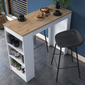 Barový stôl JANINA – Štýl a praktickosť pre vašu jedáleň a kuchyňuObjavte JANINA – moderný barový stôl, ktorý perfektne doplní vašu jedáleň alebo kuchyňu. Kombinácia bieleho a orechového dekoru dodáva tomuto kúsku elegantný a nadčasový vzhľad.Vlastnosti produktu:Materiál: Kvalitný melamín a VT laminát zaisťujú vysokú odolnosť a jednoduchú údržbu.Rozmery: 100 x 120 x 50 cm – ideálny pre rôzne typy interiérov, od menších priestorov až po väčšie miestnosti.Farba: Elegantná kombinácia bieleho dekoru s orechovým akcentom.Vybavenie: Praktický regál s tromi policami pre úložný priestor.Tvar: Obdĺžnikový dizajn pre ľahké umiestnenie k stene alebo do priestoru.Počet políc: 3 police poskytujú dostatok miesta na uloženie drobností či kuchynských potrieb.Hrúbka materiálu: 18 mm – zaisťuje stabilitu a pevnosť stola.Barový stôl JANINA je dodávaný v demonte, čo uľahčuje jeho prepravu a montáž. Prineste do svojho domova funkčnú eleganciu a využite stôl ako praktický prvok vo svojej jedálni alebo kuchyni.