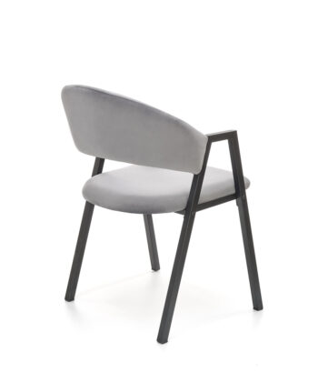 Jedálenská stolička K473 v sivej a čiernej farbe je moderným doplnkom do každého interiéru. Jej tmavý odtieň dodáva priestoru eleganciu a štýl. Stolička je vyrobená z kvalitného materiálu - látky a práškovanej ocele, ktoré zaručujú jej dlhú životnosť a odolnosť.