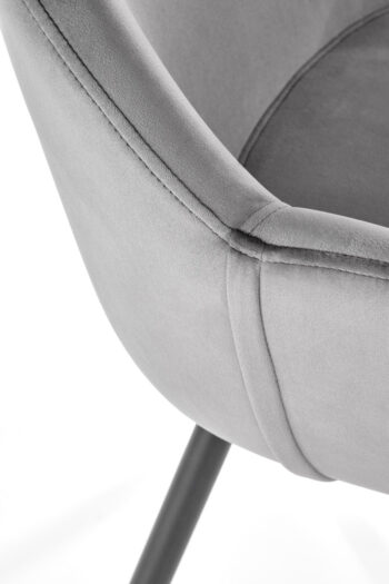 Jedálenská stolička K480 v sivej a čiernej farbe je moderným doplnkom do každého interiéru. Jej tmavý odtieň dodáva priestoru eleganciu a sofistikovanosť. Stolička je vyrobená z kvalitného materiálu - látky a práškovanej ocele, ktoré zaručujú jej dlhú životnosť a odolnosť.