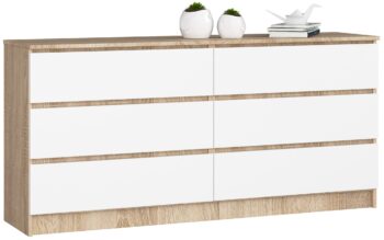 Komoda TOM160: Moderná kombinácia duba Sonoma a bielej farby Typ a dizajn: TOM160 je štýlová komoda a skrinka, ktorej dizajn kombinuje pokojnú eleganciu duba Sonoma s čistotou bielej farby. Materiál: Vyrobené z kvalitného LTD, táto komoda vám poskytne trvanlivý a odolný kus nábytku do vašej domácnosti. Rozmery: S kompaktnými rozmermi 77 x 160 x 40 cm je TOM160 ideálne riešenie pre tých, ktorí hľadajú priestranný, ale kompaktný úložný priestor. Farba : Moderná kombinácia dubu Sonoma a bielej dodá vášmu interiéru svieži a súčasný vzhľad. Vybavenie: S 6 zásuvkami a ďalším úložným priestorom ponúka TOM160 dostatok miesta na usporiadanie vecí. Odporúčané umiestnenie:  Spálňa: Ideálna pre ukladanie oblečenia, doplnkov a osobných potrieb. Obývacia izba: Skvelé na uloženie kníh, multimediálnych zariadení alebo dekoračných predmetov.