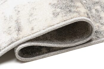 Krémový dizajnový koberec so sivým abstraktným vzorom Šírka: 80 cm | Dĺžka: 150 cm