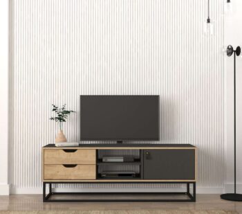 Zoznámte sa s LORES, TV stolíkom, ktorý kombinuje funkčnosť s moderným dizajnom, ideálny pre každú obývaciu izbu. Jeho elegantná svetlo hnedá a antracitová farba spoločne s praktickým dizajnom poskytujú nielen úložný priestor, ale aj dotvárajú štýlový vzhľad vášho domova.Detailné špecifikácieTyp tovaru: TV stolíkMateriál: Vysoko kvalitný LTD materiál s hrúbkou 18 mm, ktorý zaisťuje vysokú odolnosť a stabilitu.Rozmery: 150 x 53.2 x 35 cm, perfektne sa hodí na umiestnenie televíznych prijímačov a inej elektroniky.Farba: Kombinácia svetlo hnedej a antracitovej, ktorá prináša moderný a sofistikovaný vzhľad.Vybavenie: Stolík obsahuje regál, dve zásuvky a jednodverovú skrinku, čo ponúka rozmanité možnosti pre organizáciu a úložný priestor.Počet dverí, dvierok: Jeden dverový segment, poskytujúci skrytý priestor na uskladnenie ďalších potrieb.Dodatočné informácie: Dodávame v demontovanom stave, čo uľahčuje transport a montáž.TV stolík LORES je výnimočný svojou multifunkčnosťou a moderným dizajnom, čo z neho robí nielen praktický, ale aj vizuálne atraktívny kus nábytku, ktorý obohatí akúkoľvek obývaciu izbu.