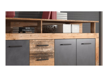 Štvordverová komoda so zásuvkami Lunysa v elegantnom prevedení dub tmavý a grafit je ideálnym riešením pre moderné interiéry. Táto komoda, ktorá patrí do kategórie klasických zásuvkových komôd, ponúka praktické úložné priestory s tromi zásuvkami a štyrmi dverami. Vďaka svojmu…