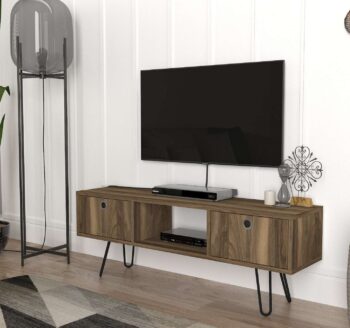 Predstavujeme MONDA, TV stolík, ktorý prináša do vašej obývačky eleganciu a moderný dizajn. Tento úzky a štýlový nábytok v orechovej farbe je navrhnutý tak, aby poskytoval praktické a estetické riešenie pre vaše multimediálne zariadenia a ďalšie potreby.Detailné špecifikácieTyp tovaru: TV stolíkMateriál: Kvalitné LTD a kov, s hrúbkou materiálu 18 mm, zaisťujúce odolnosť a dlhú životnosť.Rozmery: 120 x 43.1 x 29.5 cm, ideálny pre moderné a kompaktné obývacie priestory.Farba: Elegantný orech, ktorý pridáva teplý a prirodzený nádych vášmu interiéru.Vybavenie: Regálka a skrinka, poskytujúca dostatok úložného priestoru pre elektroniku, knihy alebo dekorácie.Vzhľad: Úzky dizajn, ktorý je ideálny pre menšie priestory alebo pre vytvorenie štýlového prvku vo vašej obývačke.Počet dverí, dvierok: Dvoch dverové, čo zaisťuje efektívne a estetické skryté úložné riešenie.Dodatočné informácie: Produkt je dodávaný v demontovanom stave, čo uľahčuje transport a montáž.TV stolík MONDA je skvelou voľbou pre tých, ktorí hľadajú moderný a funkčný nábytok s elegantným vzhľadom. Jeho orechová farba a minimalistický dizajn prinášajú do vášho domova teplo a moderný štýl.