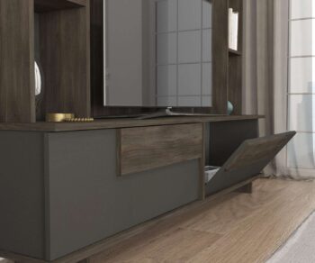 Zoznámte sa s MURDO, vysokým TV stolíkom, ktorý svojim dizajnom v tmavo hnedej a antracitovej farbe pridáva každej obývacej izbe elegantný a moderný vzhľad. Tento robustný kus nábytku ponúka praktické úložné riešenie vďaka svojim dvom plným dverám a úzkemu, ale vysokému profilu, ktorý šetrí priestor a zároveň poskytuje dostatok úložného priestoru.Kľúčové vlastnostiTyp tovaru: TV stolíkMateriál: Odolné LTD s hrúbkou 18 mm, čo zaručuje vysokú odolnosť a dlhú životnosť.Rozmery: 180 x 145 x 22 cm, ideálny pre veľké obývacie priestory, kde dominuje moderný dizajn.Farba: Kombinácia tmavo hnedej a antracitovej dodáva sofistikovaný a profesionálny vzhľad.Vybavenie: Dve skrinky poskytujú bohatý úložný priestor pre elektroniku, knihy a iné predmety.Počet dverí, dvierok: Dve dvere, ktoré sú praktické a zároveň udržujú vzhľad jednoduchý a elegantný.Dodatočné informácie: Dodávame v demontovanom stave, čo uľahčuje transport a zostavenie produktu.TV stolík MURDO je perfektnou voľbou pre tých, ktorí hľadajú elegantný, ale praktický kus nábytku, ktorý zvýrazní moderný charakter ich domova. Jeho dizajn a funkčnosť sú pripravené splniť očakávania aj tých najnáročnejších používateľov.