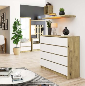 MICHALA120: Dokonalá Synergia Dubu Artisan a Čistej Bielej Zoznámte sa s MICHALA120, komodou, ktorá kombinuje hĺbku duba Artisan s nekonečnou eleganciou čistej bielej. Táto moderná, vysoká skrinka je stelesnením dizajnovej dokonalosti a je ideálnym doplnkom do vášho moderného bytu či domu.  Typ tovaru: Komoda, skrinka  Vhodná do: spálňa a obývacia izba Materiál: LTD Rozmery: 99 x 120 x 40 cm Farba: dub artisan + biela Vybavenie: 6 zásuviek a viac  Štýl: moderné, dizajnové Vzhľad: vysoká  Komoda MICHALA120 je nielen vizuálne pôsobivá, ale aj maximálne funkčné. So šiestimi priestrannými zásuvkami a ďalšími úložnými možnosťami je ideálny na uchovanie všetkých vašich nevyhnutností. Umiestnite ju do svojej spálne na uskladnenie odevu, alebo do obývacej izby ako elegantný úložný prvok. Kombinácia duba Artisan s bielym prevedením prináša do priestoru svieži, avšak teplý vzhľad.