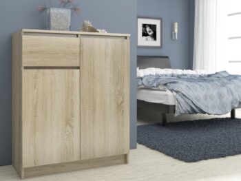 Komoda NIKOL80: Moderná elegancia v prírodnom štýle dub Sonoma Typ tovaru: Komoda, skrinka NIKOL80 vo farbe dub Sonoma prináša do vášho domova dokonalú kombináciu moderného designu s teplým a prírodným vzhľadom duba. Táto komoda bude ideálnym doplnkom ako pre vašu spálňu, tak aj pre obývaciu izbu.  Materiál: LTD - zaručuje odolnosť a dlhodobú výdrž Rozmer: 99 x 80 x 40 cm - dokonalé rozmery pre optimálne využitie priestoru Farba: Dub Sonoma - teplý a elegantný odtieň pridávajúci pohodu do každého interiéru Vybavenie: 1 praktická zásuvka a dvierka s plným dizajnom pre jednoduchú organizáciu vašich vecí Štýl: Moderné a dizajnové prevedenie, ktoré splní očakávania aj tých najnáročnejších zákazníkov Vzhľad: Vysoká konštrukcia s dvoma dverami a štyrmi úložnými policami  NIKOL80 vo farbe dub Sonoma je dokonalým spojením funkčnosti a dizajnu. Pridajte do svojho interiéru kúsok prírodnej krásy a užívajte si komfortné a štýlové úložné riešenie.