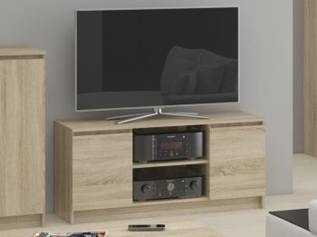 TV stolík ROMANA140: Elegantný dizajn v odtieni dub Sonoma  Stretli ste sa už s ROMANA140? Predstavujeme vám tento skvost medzi TV stolíkmi, ktorý je dokonalým spojením moderného dizajnu a praktickosti. S jeho estetikou v odtieni dub Sonoma prinesie do vašej obývačky teplý a príjemný pocit.   Typ tovaru: TV stolík Vhodné do miestnosti: obývacia izba < strong>Materiál: LTD Rozmer: 55 x 140 x 40 cm Farba: dub Sonoma< /li> Vybavenie: dvierka plné (skrinka) Štýl: moderné, dizajnové Počet políc: 2   ROMANA140 nielen zaujme svojím vzhľadom, ale aj svojou funkcionalitou. Vďaka dvom policam a skrinke s plnými dvierkami je ideálnym miestom na uloženie všetkých vašich multimediálnych zariadení a príslušenstva. Elegancia spojená s funkciou - to je ROMANA140.