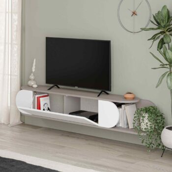 TV Stolík MELGA: Elegancia svetlá mocca pre vašu obývaciu izbu Zamýšľate sa nad kúpou nového TV stolíka pre vašu obývačku? Potom nenechajte ujsť MELGA. Jeho moderný dizajn vo svetle moka odtieňa prináša jedinečný vzhľad a funkčnosť do vášho domova.  Materiál: Vybraný melamín a VT laminát, ktorý zaisťuje dlhú odolnosť a minimálnu údržbu.< /li> Rozmery: 30 x 180 x 29.6 cm - ideálny pre rôzne veľkosti televízií a doplnkov. Farba: Výnimočná kombinácia svetlá mocca a biele, čo dodáva stolíku výrazný a elegantný vzhľad. Funkcia: Intuitívne push to open systém pre jednoduché otváranie.  Vybavenie: Výklopné priehradky, poskytujúce množstvo úložného priestoru. Tvar: Klasický obdĺžnikový a rovný dizajn, dokonale zapadne do každého moderného interiéru. Hrúbka materiálu: 18mm pre solídnu a stabilnú konštrukciu.  TV stolík MELGA je nielen praktickým riešením pre váš televízor, ale tiež dizajnovým kúskom, ktorý upúta pozornosť a oživí atmosféru vašej obývačky.