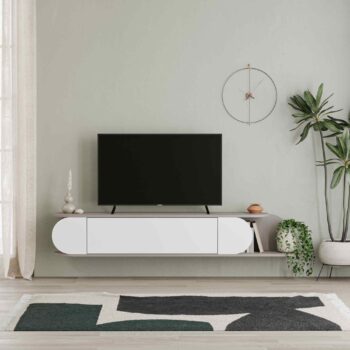 TV Stolík MELGA: Elegancia svetlá mocca pre vašu obývaciu izbu Zamýšľate sa nad kúpou nového TV stolíka pre vašu obývačku? Potom nenechajte ujsť MELGA. Jeho moderný dizajn vo svetle moka odtieňa prináša jedinečný vzhľad a funkčnosť do vášho domova.  Materiál: Vybraný melamín a VT laminát, ktorý zaisťuje dlhú odolnosť a minimálnu údržbu.< /li> Rozmery: 30 x 180 x 29.6 cm - ideálny pre rôzne veľkosti televízií a doplnkov. Farba: Výnimočná kombinácia svetlá mocca a biele, čo dodáva stolíku výrazný a elegantný vzhľad. Funkcia: Intuitívne push to open systém pre jednoduché otváranie.  Vybavenie: Výklopné priehradky, poskytujúce množstvo úložného priestoru. Tvar: Klasický obdĺžnikový a rovný dizajn, dokonale zapadne do každého moderného interiéru. Hrúbka materiálu: 18mm pre solídnu a stabilnú konštrukciu.  TV stolík MELGA je nielen praktickým riešením pre váš televízor, ale tiež dizajnovým kúskom, ktorý upúta pozornosť a oživí atmosféru vašej obývačky.