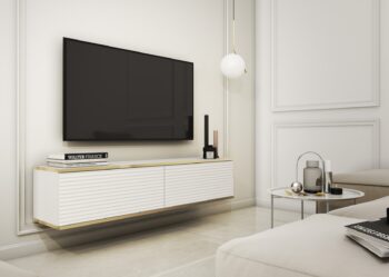 Moderný TV stolík ORLANDO sa stane pýchou každej obývačky. Zavesením na stenu v miestnosti pôsobí vzdušne a nadčasovo. Pre produkt boli použité módne farby a odolné materiály. Je vybavený dvoma priehradkami, ktoré poskytujú priestor pre rôzne typy elektronických zariadení a ďalšie príslušenstvo. Tiché a jemné otváranie dvierok zabezpečí push to open systém, stačí len zľahka zatlačiť na čelo nábytku. Zaujímavé drážkované predné čelá so zlatým lemovaním tento produkt odlišujú od ostatných TV stolíkov a v miestnosti tak pôsobí luxusne a štýlovo. Farebné prevedenie: bielaMateriál: MDF doska vystužená ABS hranouROZMERY: Hĺbka: 32 cmŠírka: 135 cmVýška: 30 cmDodávame v demonte.  