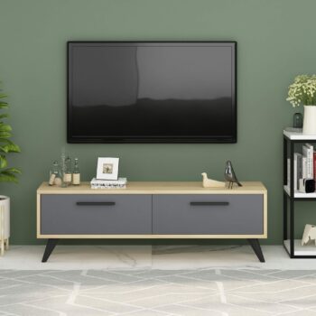 TV stolík OTTAWA - Štýlový a funkčný doplnok pre vašu obývaciu izbuHľadáte moderný a praktický TV stolík, ktorý dokonale zapadne do vašej obývačky? OTTAWA je ideálnou voľbou pre všetkých, ktorí chcú spojiť eleganciu s funkčnosťou.Typ tovaru: TV stolíkMateriál: LTDRozmer: 45 x 120 x 29,6 cmFarba: antracit + dubPočet dvierok: 2Úchytky: plastHrúbka materiálu: 18 mmDodatočné informácie: Dodávame v demonte, plastové nožičkyOTTAWA ponúka praktický úložný priestor za dvierkami, ktorý skryje všetku vašu elektroniku či iné nevyhnutnosti. Jednoduchá montáž a kvalitné spracovanie sú samozrejmosťou. Vneste do svojej obývačky moderný štýl s týmto elegantným TV stolíkom!