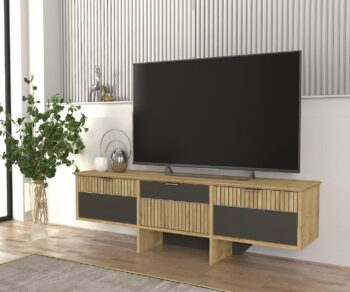 TV stolík POLETObohaťte svoju obývačku moderným a praktickým TV stolíkom POLET. Tento štýlový nábytok je navrhnutý tak, aby spĺňal všetky vaše požiadavky na funkčnosť a estetiku.Špecifikácia produktu:Názov produktu: POLETTyp tovaru: TV stolík TVVhodné do miestnosti: obývacia izbaMateriál: LTDRozmer: 150 x 45,3 x 35 cmFarba: šedá + svetlo hnedáVybavenie: skrinkaPočet dvierok: 3Hrúbka materiálu: 18 mmDodatočné informácie: Dodávame v demonteTV stolík POLET ponúka dostatok úložného priestoru vďaka trom dvierkam, za ktorými sa nachádza praktická skrinka. Je vyrobený z kvalitného materiálu LTD s hrúbkou 18 mm, čo zaisťuje jeho pevnosť a dlhú životnosť. Kombinácia šedej a svetlo hnedej farby dodáva vašej obývačke moderný a elegantný vzhľad.Vďaka jednoduchej montáži, ktorú umožňuje dodanie v demontovanom stave, si môžete svoj nový televízny stolík užívať behom chvíľky. Získajte televízny stolík POLET a vylepšite svoju obývačku štýlovým a funkčným doplnkom!