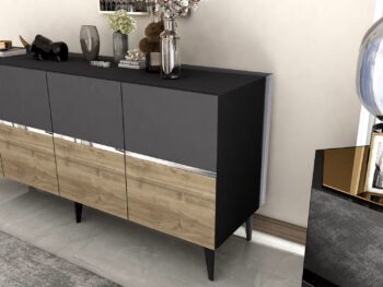 Komoda RONDO – Luxusné a priestranné úložné riešenie pre obývaciu izbuKomoda RONDO prináša do vašej obývačky nádych luxusu a elegancie. Jej široký dizajn so štyrmi plnými dvierkami ponúka dostatok úložného priestoru pre všetky vaše potreby, či už ide o knihy, dekorácie alebo iné predmety. Kombinácia antracitovej, orechovej a zlatej farby dodáva interiéru sofistikovaný vzhľad.S rozmermi 79 x 150 x 40 cm je komoda RONDO ideálnou voľbou pre každého, kto hľadá priestranné a zároveň štýlové úložné riešenie. Vyrobená z kvalitného LTD materiálu s hrúbkou 18 mm, zaisťuje pevnosť a dlhú životnosť. Plastové nožičky poskytujú stabilitu a chránia podlahu pred poškriabaním.Hlavné vlastnosti:Typ tovaru: KomodaMateriál: LTDRozmer: 79 x 150 x 40 cmVybavenie: Dvierka plnéŠtýl: LuxusnéVzhľad: ŠirokáPočet dvierok: 4Dodatočné informácie: Dodávame v demonte, plastové nožičkyFarba: Antracit + orech + striebroKomoda RONDO je dodávaná v demontovanom stave s priloženým návodom na jednoduchú montáž. Tento luxusný a praktický kus nábytku je ideálny pre každú modernú obývaciu izbu, ktorá hľadá kombináciu štýlu a funkčnosti.
