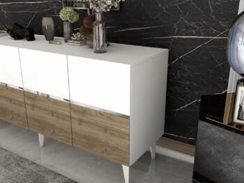 Komoda RONDO – Luxusné a priestranné úložné riešenie pre obývaciu izbuKomoda RONDO prináša do vašej obývačky nádych luxusu a elegancie. Jej široký dizajn so štyrmi plnými dvierkami ponúka dostatok úložného priestoru pre všetky vaše potreby, či už ide o knihy, dekorácie alebo iné predmety. Kombinácia antracitovej, orechovej a zlatej farby dodáva interiéru sofistikovaný vzhľad.S rozmermi 79 x 150 x 40 cm je komoda RONDO ideálnou voľbou pre každého, kto hľadá priestranné a zároveň štýlové úložné riešenie. Vyrobená z kvalitného LTD materiálu s hrúbkou 18 mm, zaisťuje pevnosť a dlhú životnosť. Plastové nožičky poskytujú stabilitu a chránia podlahu pred poškriabaním.Hlavné vlastnosti:Typ tovaru: KomodaMateriál: LTDRozmer: 79 x 150 x 40 cmVybavenie: Dvierka plnéŠtýl: LuxusnéVzhľad: ŠirokáPočet dvierok: 4Dodatočné informácie: Dodávame v demonte, plastové nožičkyFarba: Biela + orech + striebroKomoda RONDO je dodávaná v demontovanom stave s priloženým návodom na jednoduchú montáž. Tento luxusný a praktický kus nábytku je ideálny pre každú modernú obývaciu izbu, ktorá hľadá kombináciu štýlu a funkčnosti.