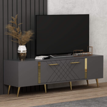 TV stolík RUBY - luxusný doplnok pre vašu obývaciu izbuTV stolík RUBY predstavuje dokonalé spojenie elegancie a funkčnosti. Je navrhnutý tak, aby sa stal výrazným prvkom vašej obývačky, a jeho luxusný štýl dodá interiéru nádych sofistikovanosti.Vyrobený z kvalitného LTD materiálu s hrúbkou 18 mm, TV stolík RUBY zaisťuje vysokú pevnosť a dlhú životnosť. Je vybavený praktickou skrinkou s jednými dvierkami, ktorá poskytuje dostatok úložného priestoru pre vaše multimediálne zariadenia a ďalšie potreby. Štýlové plastové úchytky vynikajú svojou jednoduchosťou a jednoduchou manipuláciou.Hlavné vlastnosti produktu:Typ tovaru: TV stolíkVhodné do miestnosti: obývacia izbaMateriál: LTDRozmery: 48.2 x 150 x 35 cmFarba: antracit + zlatáVybavenie: skrinkaŠtýl: luxusnéPočet dvierok: 1Úchytky: plastDodatočné informácie: Dodávame v demonte, plastové nožičkyTV stolík RUBY je dodávaný v demontovanom stave, čo uľahčuje prepravu a montáž. Plastové nožičky zaisťujú stabilitu a chránia podlahu pred poškodením.