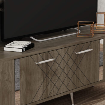 TV stolík RUBY - luxusný doplnok pre vašu obývaciu izbuTV stolík RUBY predstavuje dokonalé spojenie elegancie a funkčnosti. Je navrhnutý tak, aby sa stal výrazným prvkom vašej obývačky, a jeho luxusný štýl dodá interiéru nádych sofistikovanosti.Vyrobený z kvalitného LTD materiálu s hrúbkou 18 mm, TV stolík RUBY zaisťuje vysokú pevnosť a dlhú životnosť. Je vybavený praktickou skrinkou s jednými dvierkami, ktorá poskytuje dostatok úložného priestoru pre vaše multimediálne zariadenia a ďalšie potreby. Štýlové plastové úchytky vynikajú svojou jednoduchosťou a jednoduchou manipuláciou.Hlavné vlastnosti produktu:Typ tovaru: TV stolíkVhodné do miestnosti: obývacia izbaMateriál: LTDRozmery: 48.2 x 150 x 35 cmFarba: orech + striebornáVybavenie: skrinkaŠtýl: luxusnéPočet dvierok: 1Úchytky: plastDodatočné informácie: Dodávame v demonte, plastové nožičkyTV stolík RUBY je dodávaný v demontovanom stave, čo uľahčuje prepravu a montáž. Plastové nožičky zaisťujú stabilitu a chránia podlahu pred poškodením.