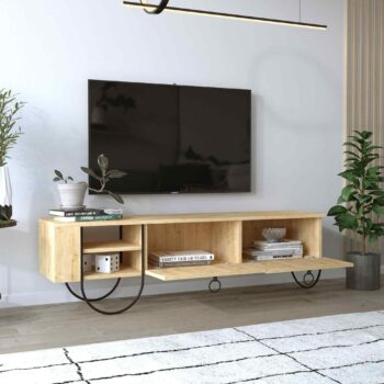 TV stolík DRENG: Vintage klenot v odtieni duba pre vašu obývaciu izbu Objavte kúzlo DRENG, TV stolík vo vintage a retro štýle, ktorý kombinuje funkčnosť s neopakovateľným vzhľadom. Odtieň duba v kombinácii s lesklými kovovými detailmi dodá vašej obývačke teplý a elegantný vzhľad.  Typ tovaru: TV stolík Materiál : Melamín, VT laminát a ďalšie, doplnený o prvky z kovu Rozmer: 43.6 x 151 x 35.6 cm Farba : Prírodný odtieň duba Vybavenie: Priestranné regály a výklopné priehradky, ideálne na uskladnenie vašich multimediálnych zariadení Štýl: Vintage a retro Tvar: Obdĺžnikový s čistými líniami Hrúbka materiálu: 18mm pre maximálnu trvanlivosť Dodatočné informácie: Možnosť zavesenia, výrazné lesklé kovové detaily  DRENG je ideálnou voľbou pre všetkých, ktorí hľadajú nielen funkčné, ale aj štýlový kus nábytku, ktorý sa stane ozdobou každej obývačky.