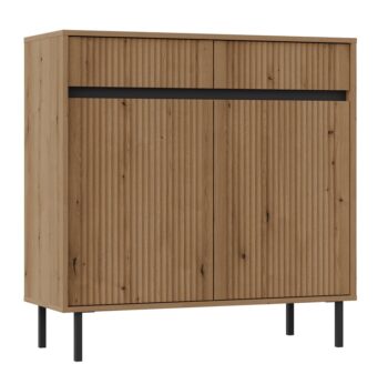 Obývací sektor SELESTA je v minimalistickom prevedení. Je spestrená dizajnom japonskej estetiky. Nábytok má elegantné vysoké nožičky, ktoré sú v čiernej farbe a sú vyrobené z kovu. Dodávajú nábytku ľahkosť. Výraznou dekoráciu nábytku sú drážkované čelá. Jednotlivé prvky SELESTA boli navrhnuté tak, aby každý prvok mohol byť použitý samostatne.Predná časť je vyrobená z kvalitného MDF materiálu v kombinácii s LTD o hrúbke 16 mm. Dosky sú nenáročné na údržbu. Korpus je vyrobený z LTD dosiek, s ABS hranami. Nožičky sú kovové, v čiernom prevedení. Farba: dub EvokeRozmery:šírka: 100 cmvýška: 85 cmhĺbka: 40 cmvýška nožičiek 15 cm.Dodávame v demontovanom stave.