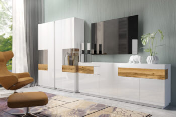 SELINKA 25 je kombinovaná štvordverová komoda s 2 šuplíkmi. Patrí k nábytku SELINKA, ktorý je charakteristický svojim kvalitným prevedením a praktickým riešením. Oceníte aj efektné prevedenie a celkový dizajn. Zaujímavé prepojenie dvoch farieb zvýrazňuje jedinečnosť tohto nábytku. Vďaka viacerým farebným kombináciám si z tejto kolekcie vyberie každý .Korpus nábytku je vyrobný z LTD dosky v bielej farbe. Dvierka sú z MDF dosky, potiahnutej kvalitnou membránovou fóliou, vo farebnom prevedení biely lesk. Základná biela farba je doplnená štýlovými vkladmi vo farebnom odtieni moreného dubového wotanu. Tento materiál je nenáročný na údržbu.Komoda má v hornej časti sú 2 šuplíky, spodné časti sú dvierkové. Za každými dvierkami je umiestnená jedna vnútorná polička. Dvierka sú bezúchytové, využívajú systém push to open.Rozmery (š/v/h): 219/85/40 cm. Dodávame v demonte.