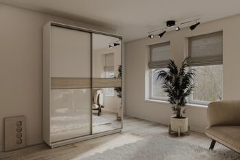 STEPHANIE je dvojdverová moderná šatníková skriňa, ktorá je charakteristická praktickým úložným priestorom. Skriňa disponuje posuvnými dverami. Je vo farebnom prevedení biela / dub Sonoma.Šatníková skriňa má netypickú výšku, až 220 cm, čím sa zabezpečí väčší úložný priestor. Skriňa je členená na policovú a závesnú časť s jednou závesnou tyčou.Šatníková skriňa je vyrobená z kvalitnej LTD dosky, ktorá sa jednoducho udržiava.Rozmery:výška: 220 cmšírka: 180 cmhĺbka: 60 cm.Dodávame v demontovanom stave. 