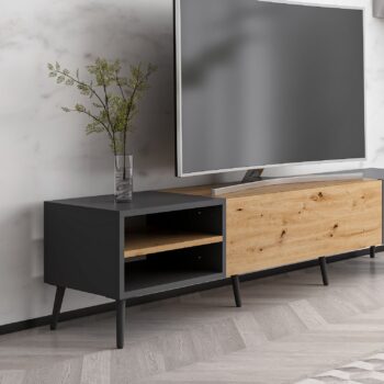 TV stolík STREAM – Moderný a funkčný doplnok do vašej obývačkyTV stolík STREAM prináša elegantnú kombináciu moderného dizajnu a praktického využitia. Vďaka jednému plnému dvierku a regálku ponúka dostatok úložného priestoru pre elektroniku, káble a ďalšie doplnky. Štýlová farebná kombinácia duba Artisan a antracitu dodáva stolíku jedinečný vzhľad, ktorý sa hodí do každej obývačky.Hlavné vlastnosti produktu:Typ tovaru: TV stolíkVhodné do miestnosti: Obývacia izbaMateriál: Melamín, VT laminátRozmery: 40 x 180 x 35 cmFarba: Dub Artisan + antracitVybavenie: Plné dvierka a regálokPočet dvierok: 1Hrúbka materiálu: 18 mmDodatočné informácie: Dodávame v demonteTV stolík STREAM je vyrobený z odolných materiálov, ktoré zaisťujú dlhú životnosť a jednoduchú údržbu. Jeho jednoduchý dizajn a praktické usporiadanie prispievajú k pohodliu a estetike vášho domova. Zaobstarajte si TV stolík STREAM a vytvorte si štýlový a organizovaný obývací priestor!