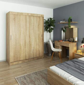 AIRI150 - Šatníková skriňa, kde tradičný dizajn stretáva modernú funkčnosť Materiál: Spoľahlivý LTD, zaručujúci vysokú odolnosť a dlhú životnosť skrine. Farba: Prírodný odtieň duba Sonoma, ktorý do vašej spálne vnesie teplý a klasický nádych.  Rozmery: 200 x 150 x 60 cm - priestranná skriňa , Ktorá pohodlne pojme všetky vaše oblečenie a doplnky bez toho, aby pritom pôsobila neprehľadne. Vybavenie: Viac ako 6 políc ponúka dostatok priestoru pre systematickú organizáciu vášho oblečenia a doplnkov. > Počet dverí: Dvojdverový dizajn pre ľahký a rýchly prístup k uloženým veciam. Počet políc: 6 pevných políc, ktoré zvyšujú vaše možnosti úložného priestoru.  Prineste do svojej spálne kúsok prírody s AIRI150 šatníkovou skriňou. Pre milovníkov tradičného designu, ktorí nechcú robiť kompromisy v oblasti funkčnosti.