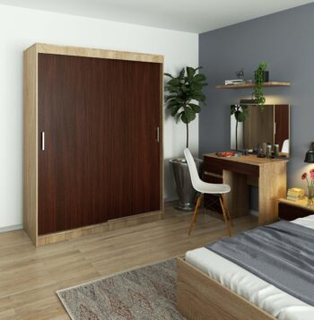 AIRI150 - Prirodzená elegancia pre vašu spálňu Materiál: LTD je zárukou kvality a odolnosti, čo znamená, že vaša šatníková skriňa vydrží v nezmenenej kráse po mnoho rokov. Farba: Harmonická kombinácia duba Sonoma a hlbokého odtieňa wenge prináša do interiéru teplú a zároveň modernú atmosféru.  Rozmery: 200 x 150 x 60 cm - priestranný dizajn, ktorý ponúka dostatok miesta pre všetky vaše odevy a doplnky. Vybavenie: Viac ako 6 políc vám umožňuje uchovávať odevy organizovane a prehľadne.< /li> Počet dverí: Dvojdverový dizajn zaručuje ľahký prístup k vašim kúskom kedykoľvek ich potrebujete. Počet políc: 6 políc pre flexibilné uloženie vašich vecí podľa vašich potrieb.  S šatníkovou skriňou AIRI150 v kombinácii farieb dub Sonoma a wenge získate nielen praktické, ale aj štýlové riešenie pre vašu spálňu. Ideálna voľba pre tých, ktorí hľadajú spojenie funkčnosti a designu.