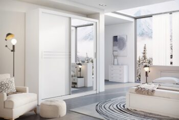 Elegantná šatníková skriňa IDEAL 12 white s posuvnými dverami a so zrkadlom. Táto dizajnová skriňa sa stane dominantným prvkom vašej domácnosti. Ponúka eleganciu a praktické riešenie priestoru. Vo vnútri je skriňa kombinovane členená. Nájdete v nej police aj vešiakovú tyč.Nábytok je vyrobený z kvalitnej LTD dosky. Decentné úchytky sú v sivej farbe, zásuvky majú kovové pojazdy. Farebné prevedenie biela. Rozmery (š/v/h): 203 x 215 x 60 cm.V našej ponuke nájdete skriňu aj v čiernej farbe.Dodávame v demontovanom stave.