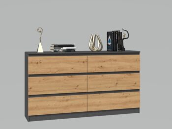 Komoda WALMA M6 140 v modernom dizajne je vhodná do každého interiéru, pretože v sebe spája jednoduchosť a eleganciu. Určite oceníte aj šesť praktických zásuviek, kde si môžete uložiť dokumenty, oblečenie alebo iné potrebné veci. Komoda je vyrobená z kvalitnej LTD dosky, ktorá je nenáročná na údržbu a odolná voči poškriabaniu. Hrany sú chránené ABS páskou. Komoda má bezúchytový systém otvárania, takže Vám v priestore nebudú zavadziať žiadne úchyty a zároveň to posilní jej moderný dizajn.Rozmery (ŠxVxH) : 138 x 77 x 40 cmFarebné prevedenie : antracit/ dub artisanDodávame v demonte.