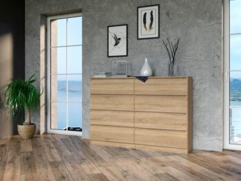 Komoda WALMA M8 140 v modernom dizajne je vhodná do každého interiéru, pretože v sebe spája jednoduchosť a eleganciu. Určite oceníte aj osem praktických zásuviek, kde si môžete uložiť dokumenty, oblečenie alebo iné potrebné veci. Komoda je vyrobená z kvalitnej LTD dosky, ktorá je nenáročná na údržbu a odolná voči poškriabaniu. Hrany sú chránené ABS páskou. Komoda má bezúchytový systém otvárania, takže Vám v priestore nebudú zavadziať žiadne úchyty a zároveň to posilní jej moderný dizajn.Rozmery (ŠxVxH) : 138 x 97 x 40 cm.Farebné prevedenie : dub sonomaDodávame v demonte.