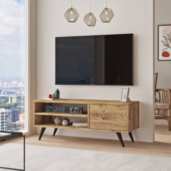 CADDY 1 - Váš ideálny televízny stolík Hľadáte televízny stolík, ktorý by dokonale zapadol do vašej obývačky alebo kancelárie? Predstavujeme CADDY 1 - stolík, ktorý kombinuje funkčnosť s elegantným dizajnom.  Typ tovaru: Stolík TV < strong>Miestnosť: Vhodný pre obývaciu izbu, kanceláriu a pracovňu Materiál: LTD s hrúbkou 18 mm Rozmer:< /strong> 110 x 40 x 44 cm Farba: Borovica Vybavenie: Dvierka plné (skrinka) a regálek< /li> Štýl: Loftové a industriálne prevedenie Tvar: Obdĺžnikový a rovný Počet dverí : 1 dverové  Jeho loftový a industriálny dizajn v kombinácii s borovicovým odtieňom prinesie do vášho interiéru moderný a súčasne útulný nádych. Okrem toho praktické dvierka a regálu ponúkajú dostatok miesta na uskladnenie vašich vecí.