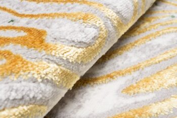 Trendový krémovo-zelený koberec so vzorom zlatých listov Šírka: 140 cm | Dĺžka: 200 cm