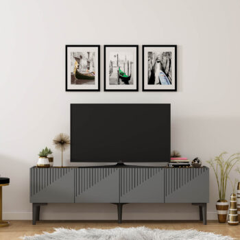 Luxusný TV stolík USER do vašej obývačkyElegantný a praktický TV stolík USER je ideálnou voľbou pre vašu obývaciu izbu. Je vyrobený z kvalitného materiálu LTD s hrúbkou 18 mm, ktorý zaručuje dlhú životnosť a odolnosť. Stolík je navrhnutý v modernom luxusnom štýle, ktorý dodá vášmu interiéru nádych elegancie.Kľúčové vlastnosti:Rozmer: 45 x 154 x 37 cmMateriál: LTDPočet dvierok: 2 plné dvierkaFarba: antracitPlastové nožičkyDodávame v demonteTV stolík USER je navrhnutý tak, aby spĺňal požiadavky na funkčnosť aj estetiku. Dve plné dvierka poskytujú dostatok úložného priestoru pre vaše multimediálne zariadenia či iné potreby. Vďaka plastovým nožičkám je stolík ľahko premiestniteľný a vhodný aj na rôzne typy podláh.Užite si pohodlie a štýl, ktorý TV stolík USER prináša do vášho domova!